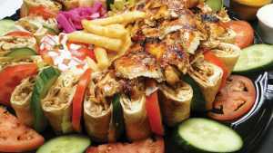 The best shawarma in Toronto | A spread of food at Ghadir Meat