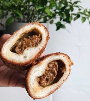 Tsuchi cafe | A kare pan, curry bread cut open at Tsuchi cafe in Toronto