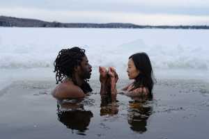 A couple takes a cold plunge at Dimensions Algonquin Highlands