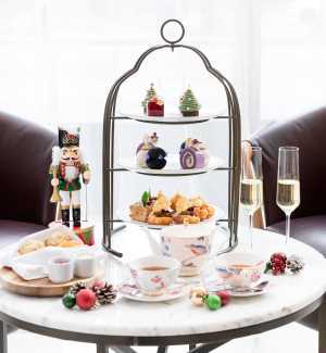 Cups of tea, glasses of champagne and a cake stand of treats at the Shangri-La Toronto Nutcracker Afternoon Tea