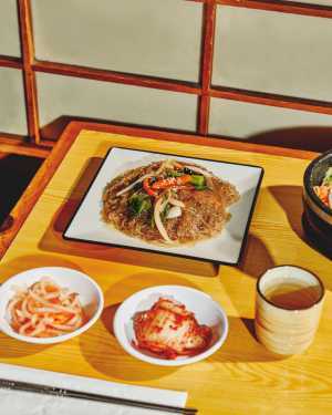 Korean Village | Japchae, a dish of stir-fried glass noodles with veggies