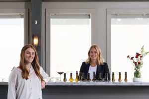 Domaine Queylus | Assistant winemaker Brooke Husband and head winemaker Kelly Masson inside Domaine Queylus's tasting room