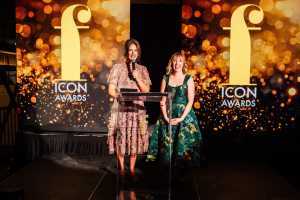 The 2024 foodism ICON Awards | CEO Krista Faist and editor Katie Bridges presenting on stage at the foodism ICON Awards