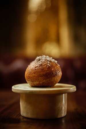 aKin Toronto | The donut is crunchy on the outside with a surprise within, is covered in truffle