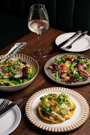 The Berczy Tavern | A spread of tostadas, salad and wine at The Berczy Tavern The Berczy Tavern | A spread of tostadas, salad and wine at The Berczy Tavern