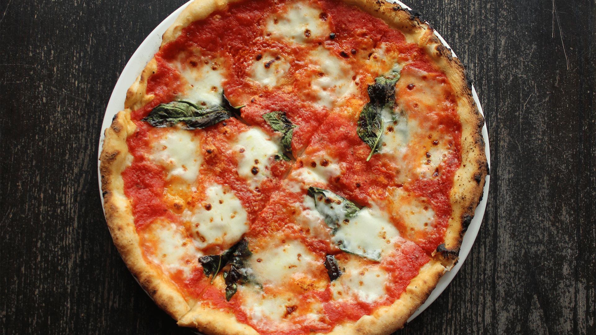 The best restaurants offering delivery and takeout in Toronto: a margherita pizza at Pizzeria Libretto