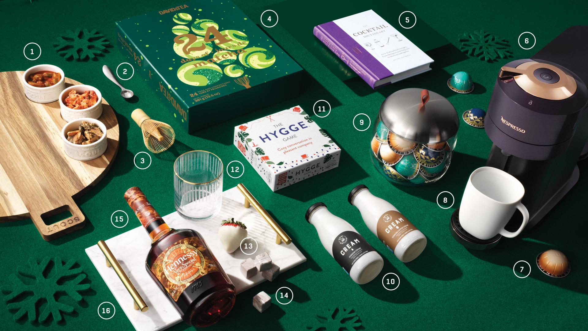 Food and drink holiday Christmas gifts | A flat lay of holiday-themed gifts Food and drink holiday Christmas gifts | A flat lay of holiday-themed gifts