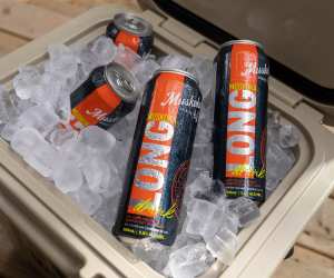 Several cans of the Muskoka Long Drink in a cooler full of ice