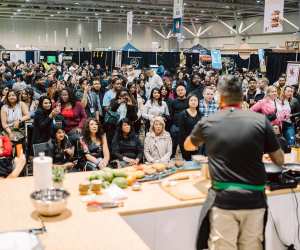 A crowd watching a cooking demonstration at T.O. Food and Drink Fest