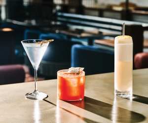 Three cocktails on the bar at Civil Works in Toronto