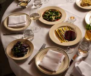 Linny's | A food spread in the dining room at Linny's