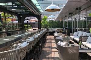 Best patios in Toronto | The bar and seating on the patio at EPOCH Bar & Kitchen Terrace