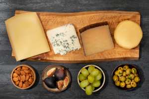 Cheeseworld online cheesery | A spread of cheese and fruit
