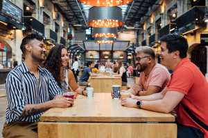 Manitoba restaurants | Friends have a drink at The Forks, Manitoba Manitoba restaurants | Friends have a drink at The Forks, Manitoba