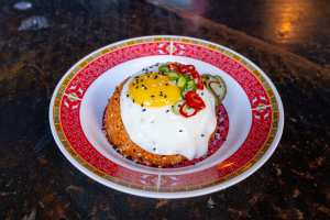 Korean restaurants Toronto | A dish with a fried egg on top at OddSeoul