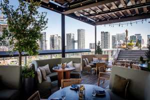 Best patios in Toronto | Lounge seating at Harriet's rooftop at 1 Hotel Toronto