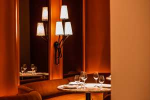 Best new Toronto restaurants | Cozy burnt orange seating at the new Daphne restaurant