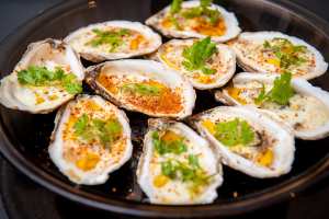 Supper clubs in Toronto | Baked oysters at Oui Aïa
