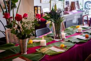 Supper clubs in Toronto | A table set with banana leaf placemats at Mystery Eats