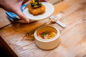 Supper clubs in Toronto | A chicken nugget with a soup underneath
