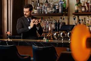 Best cocktail bars in Toronto | Bartender James Grant shaking a drink at Clockwork Bar