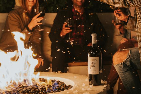 A bottle of Z. Alexander Brown Uncaged Cabernet Sauvignon by the fire