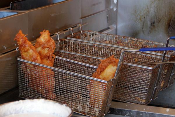 Best fish and chips in Toronto | Fish in the fryer at Sea Witch Fish and Chips