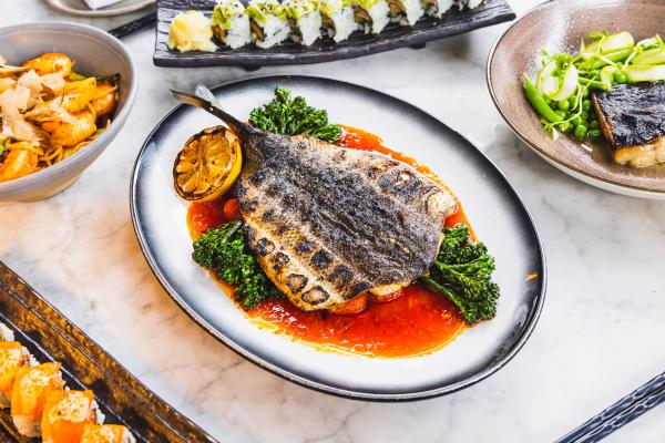 Best patios in Toronto | A whole fish dish on the patio at Kasa Moto
