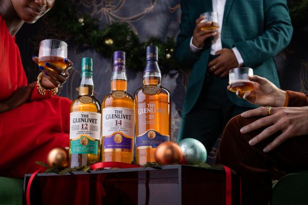 The Glenlivet | A collection of The Glenlivet scotch at a festive party