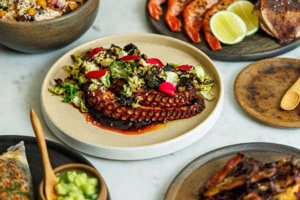Best restaurants Toronto | A spread of dishes with octopus in the centre at Quetzal