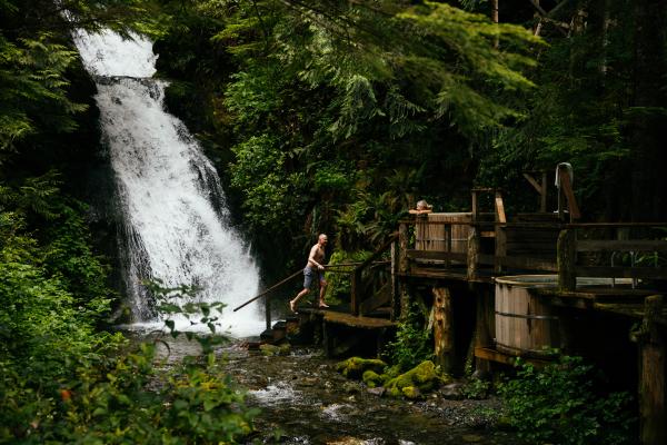 Seaweed benefits | A waterfall-side hot tub at Nimmo Bay Wilderness Resort
