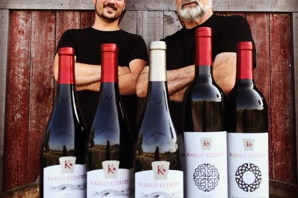 Ontario Wine Awards | Spencer Mayer and Derek Barnett with bottles of wine at Karlo Cellars