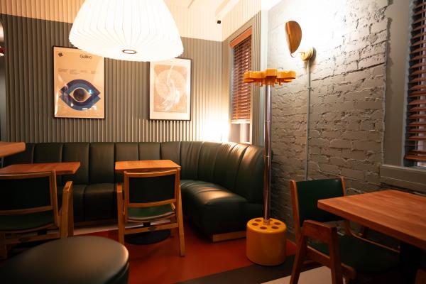 Toronto bottle shops and alcohol stores | Doc’s Green Door Lounge is full of fun furniture and cozy nooks