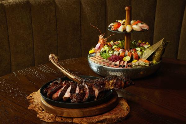 A beautiful steak and seafood tower at Blue Bovine Steak + Sushi House