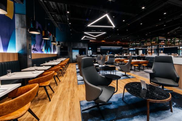 Comfortable seating inside the Aspire | Air Canada Café at Billy Bishop Toronto City Airport