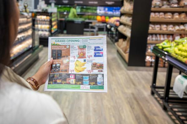 A woman looks at a flyer inside Nature's Emporium in downtown Toronto