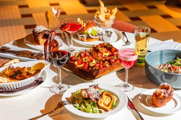 Best new Toronto restaurants | A spread of dishes and drinks at The Joneses restaurant in Toronto