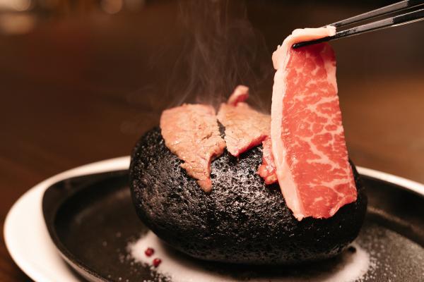 Best new restaurants in Toronto | Searing meat at Blue Bovine