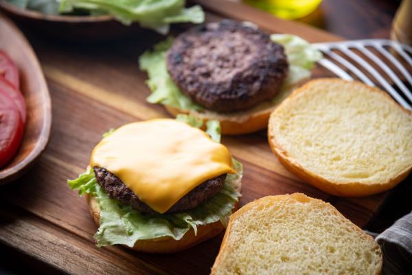 An open hamburger waiting to be dressed