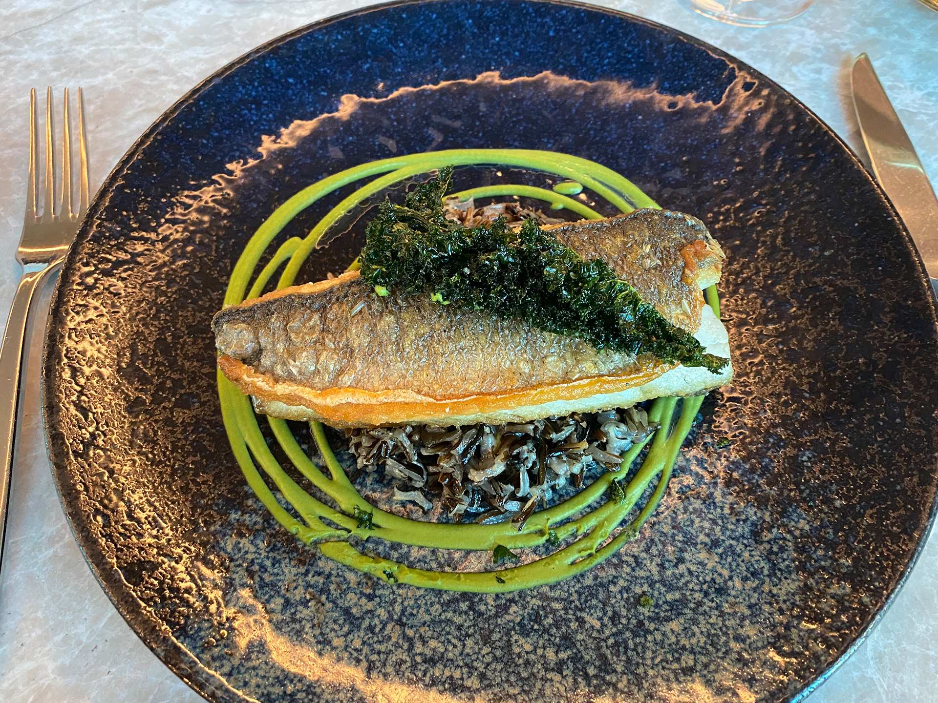 Louix Louis St. Regis Toronto | Branzino with hearty wild rice and a creamy pea and mint purée