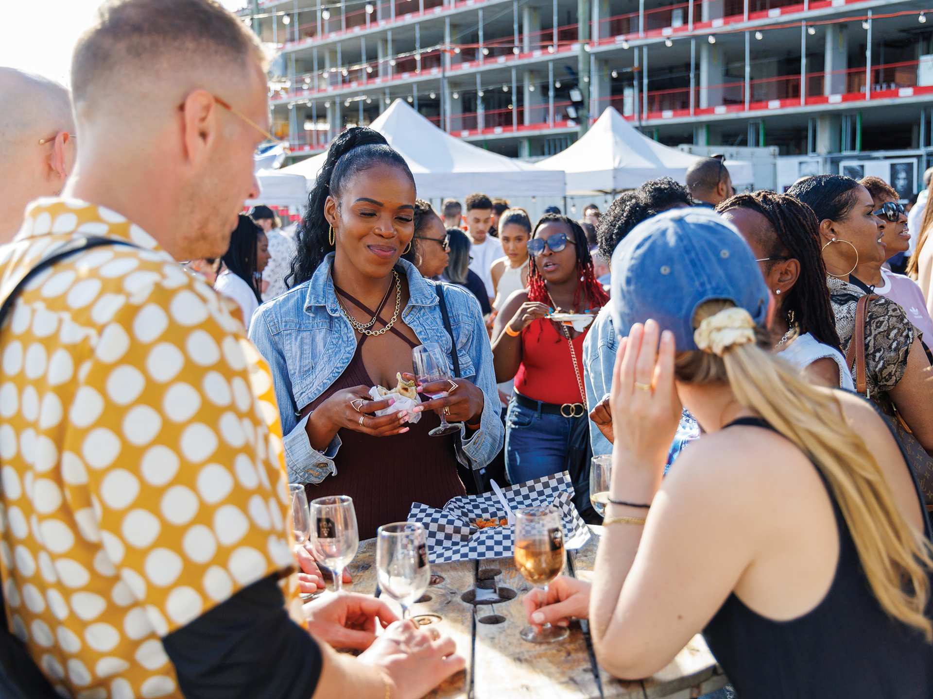 Visitors sample different wines at the Spring Into Spice festival at Stackt Market