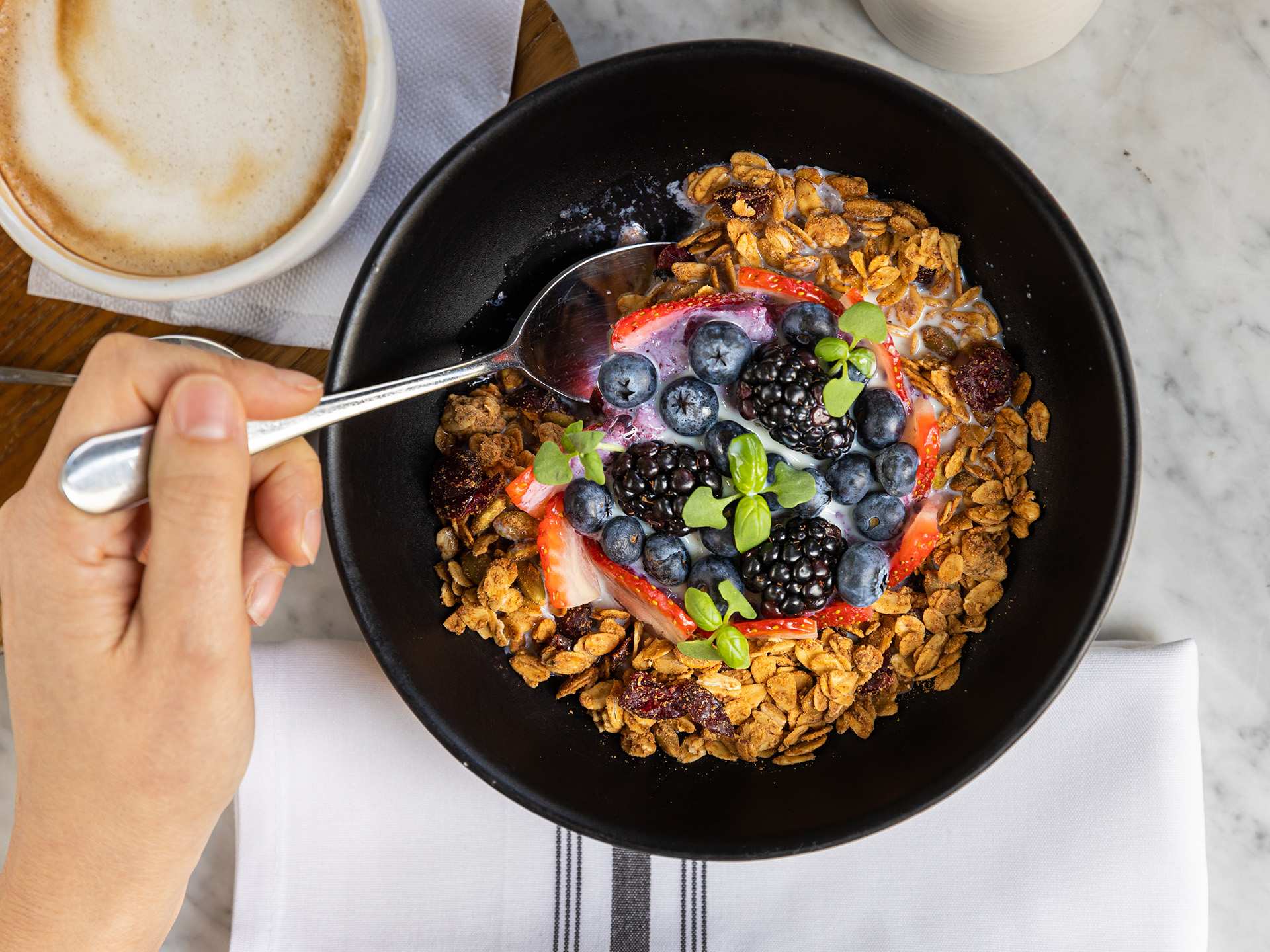 Best brunch in Toronto | Bowl of granola and blueberries for brunch at LOV in Toronto