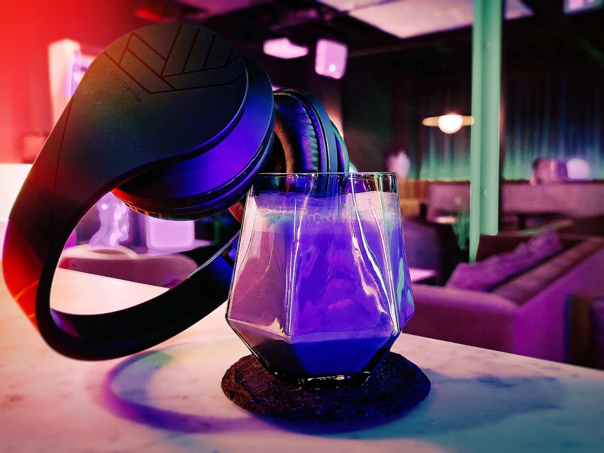 Offworld bar | The Black Hole cocktail with noise cancelling headphones at Offworld bar