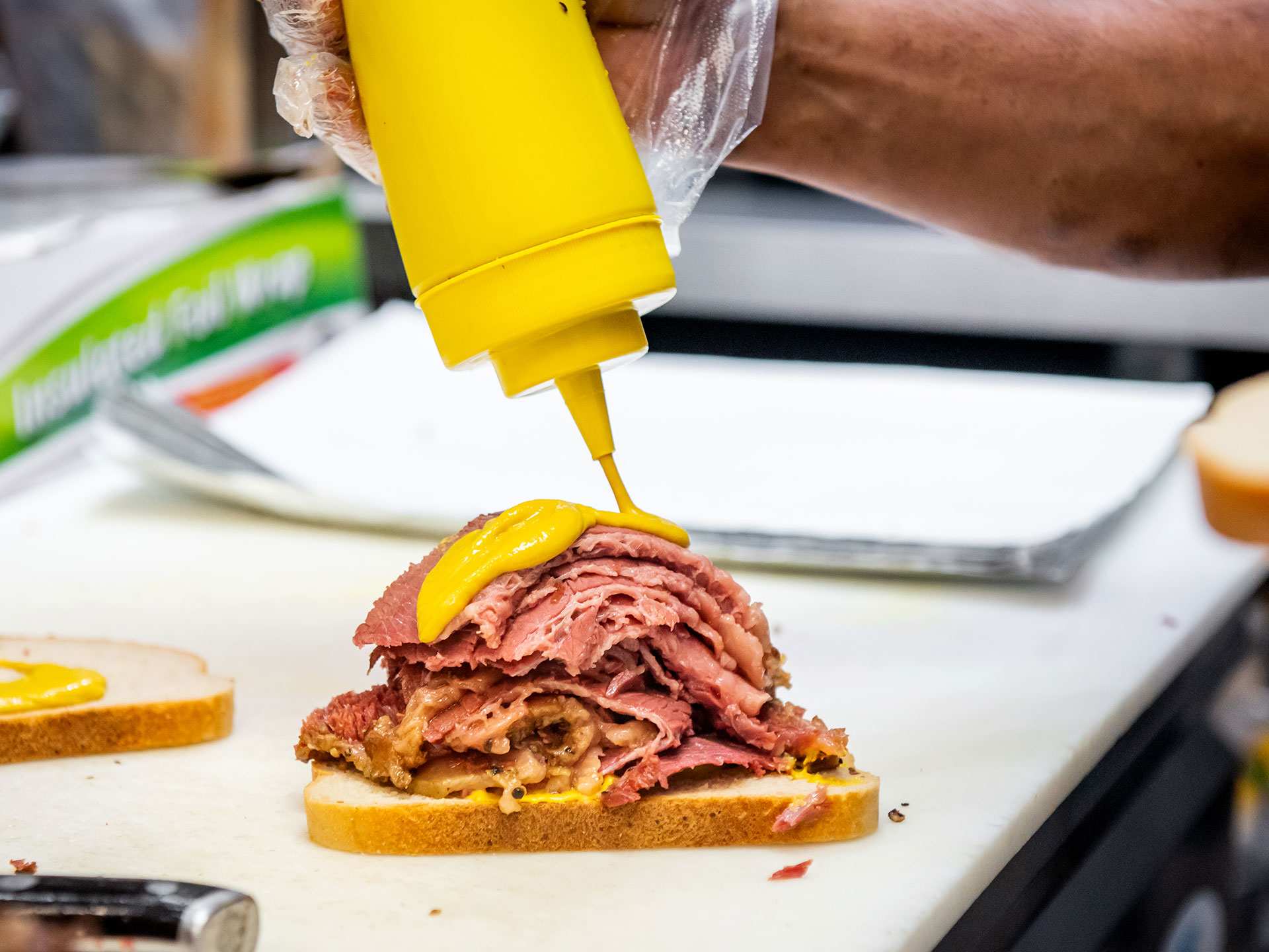 Best Scarborough restaurants | Making a sandwich at SumiLicious Smoked Meat & Deli