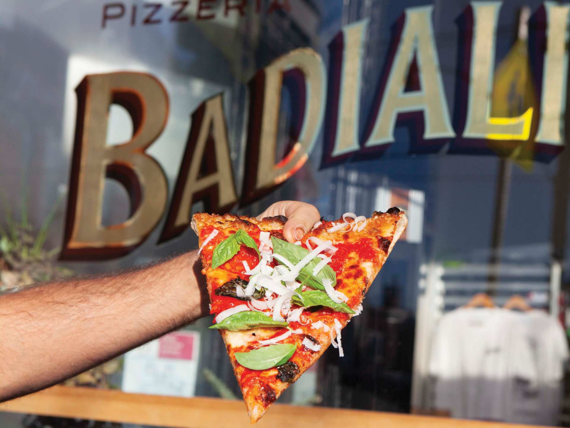 A slice of pizza at Pizzeria Badiali