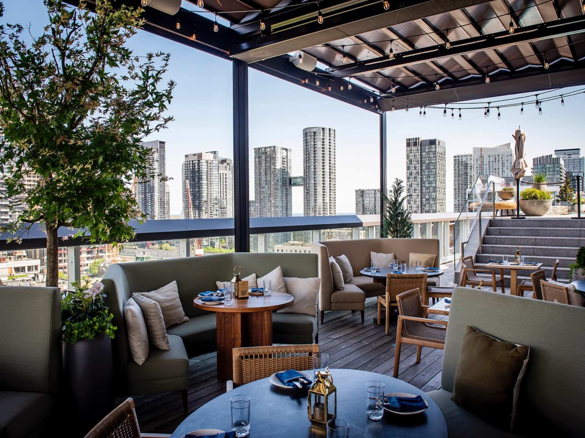 Best patios in Toronto | Lounge seating at Harriet's rooftop at 1 Hotel Toronto
