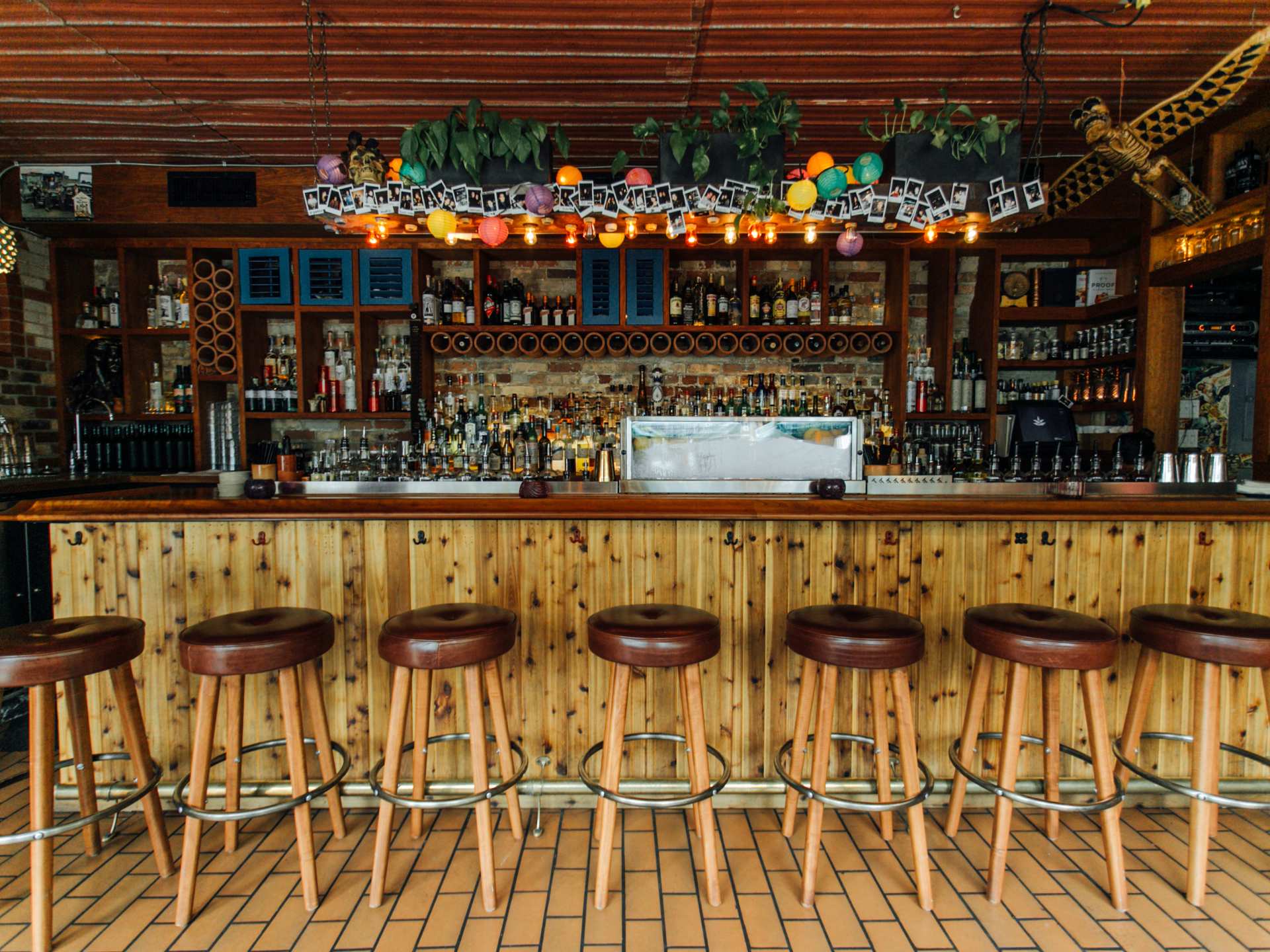 Late night eats in Toronto | The wooden bar with bar stools at El Rey in Kensington