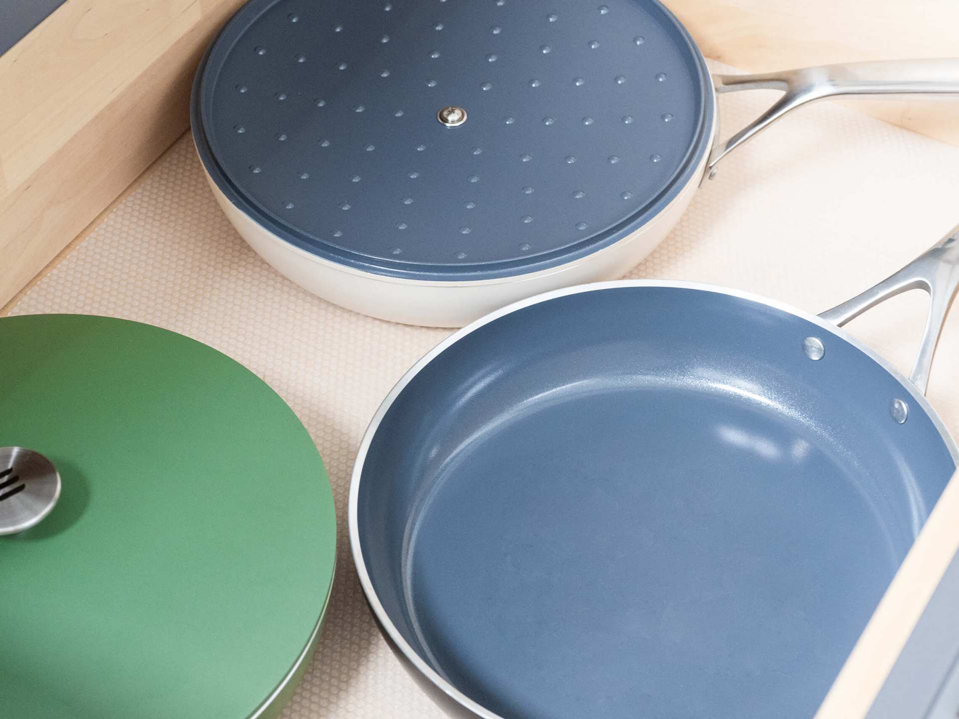 Kilne Everything Pan stacked in kitchen cupboard Kilne Everything Pan stacked in kitchen cupboard