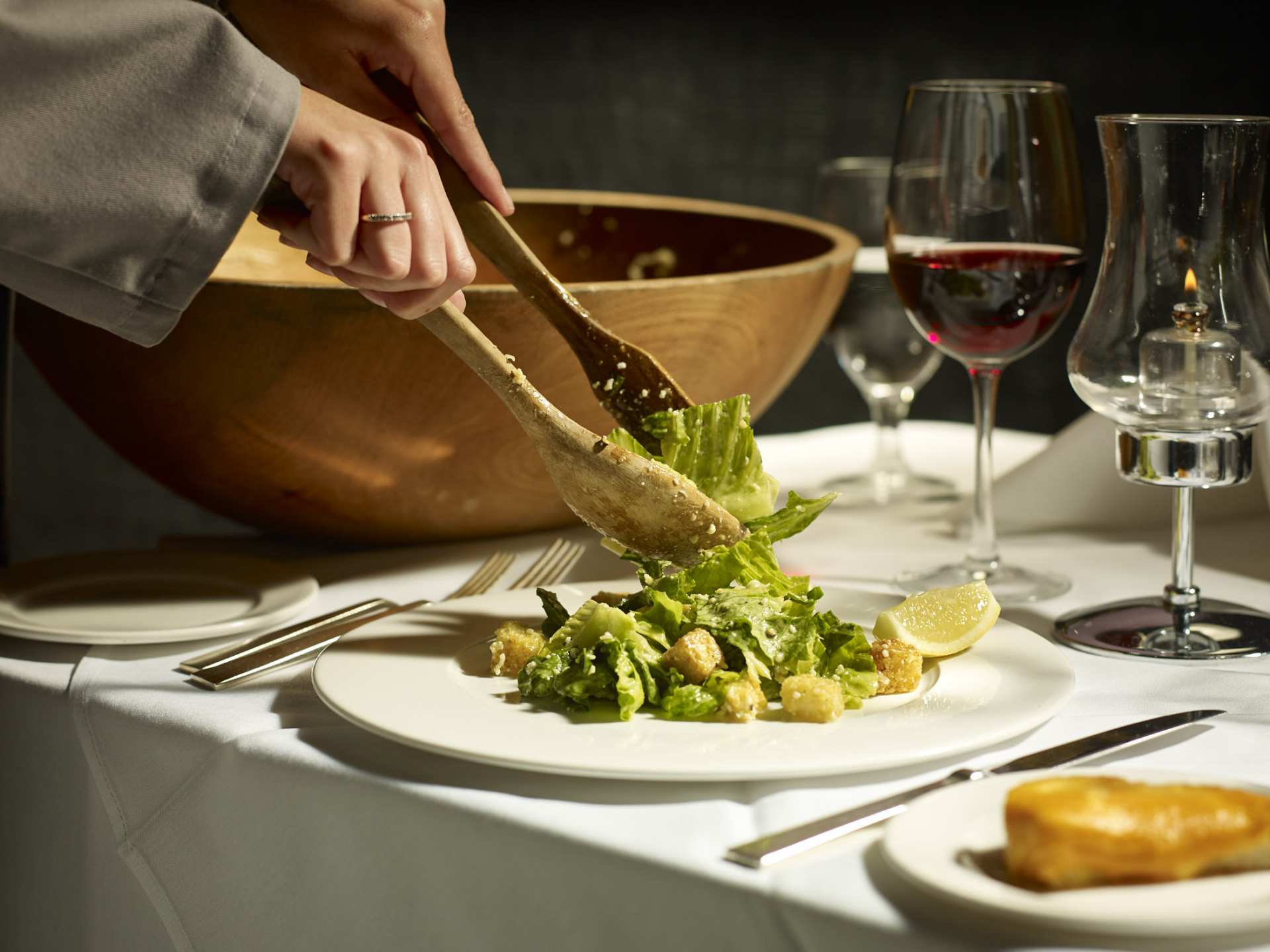Happy hours in Toronto | A caesar salad tossed tableside at Hy's Steakhouse in Toronto
