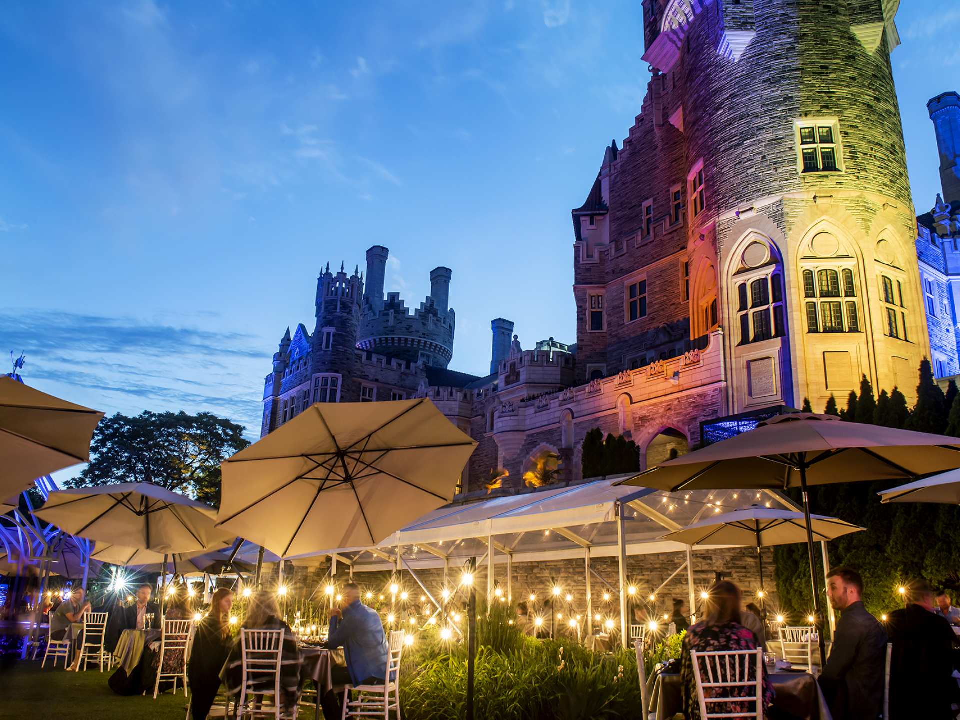 Best patios in Toronto | The Gardens at Casa Loma at dusk